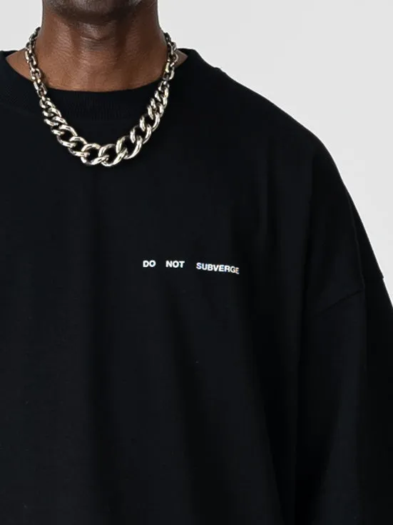 DNS006 'PLEASE DO NOT TOUCH' T-SHIRT IN BLACK