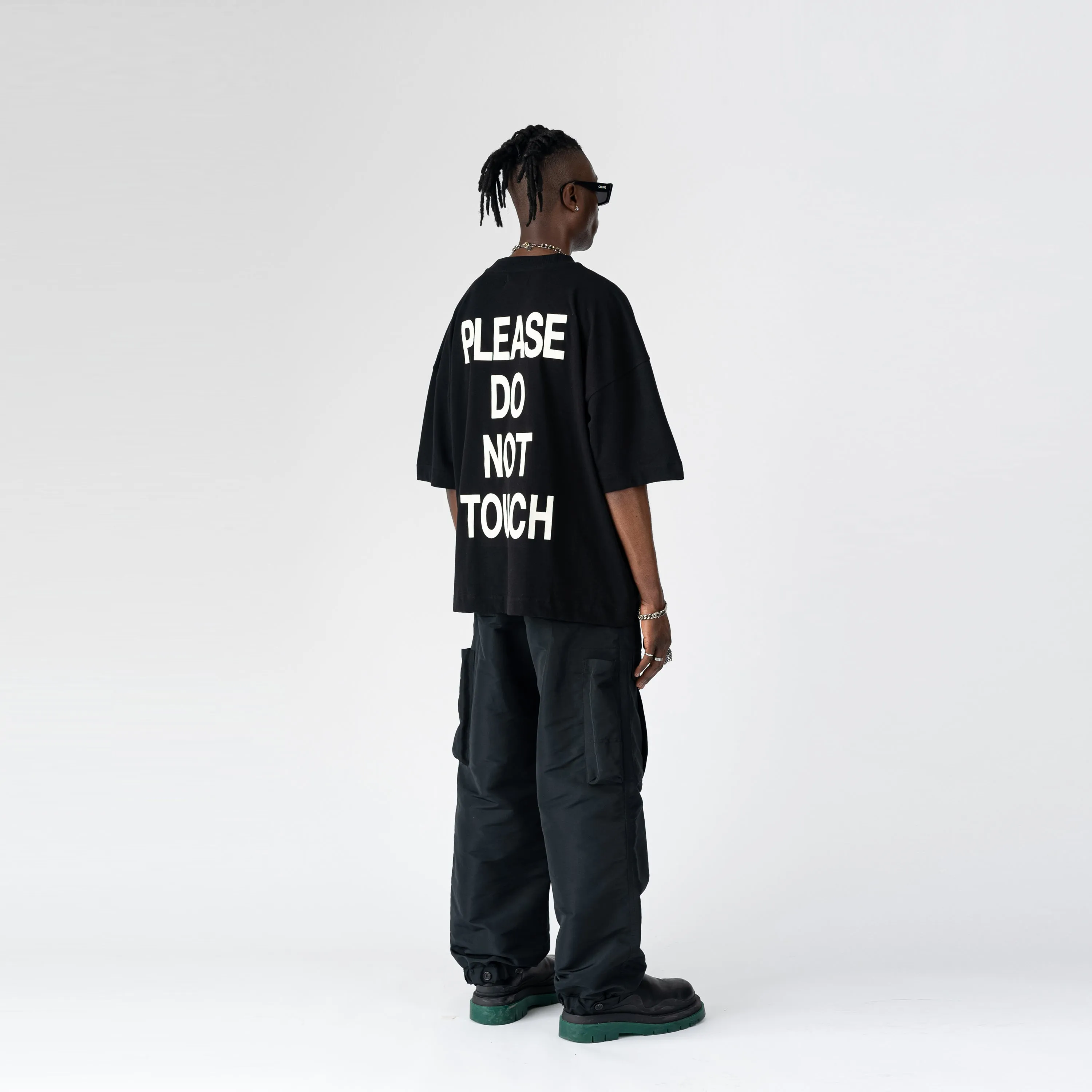 DNS006 'PLEASE DO NOT TOUCH' T-SHIRT IN BLACK